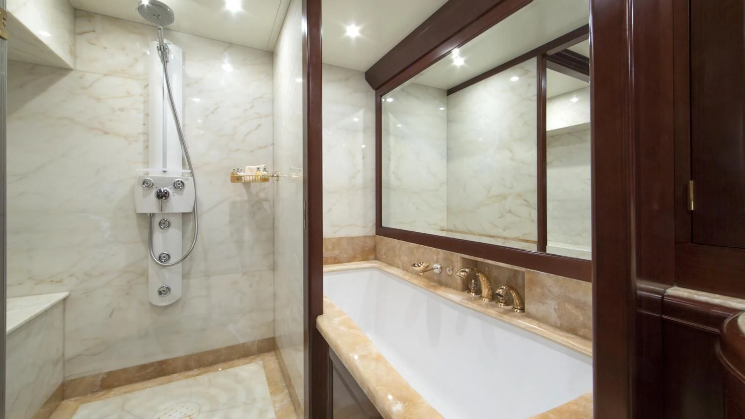 a bathroom with a bathtub and sink aboard GIORGIA I Yacht for Sale