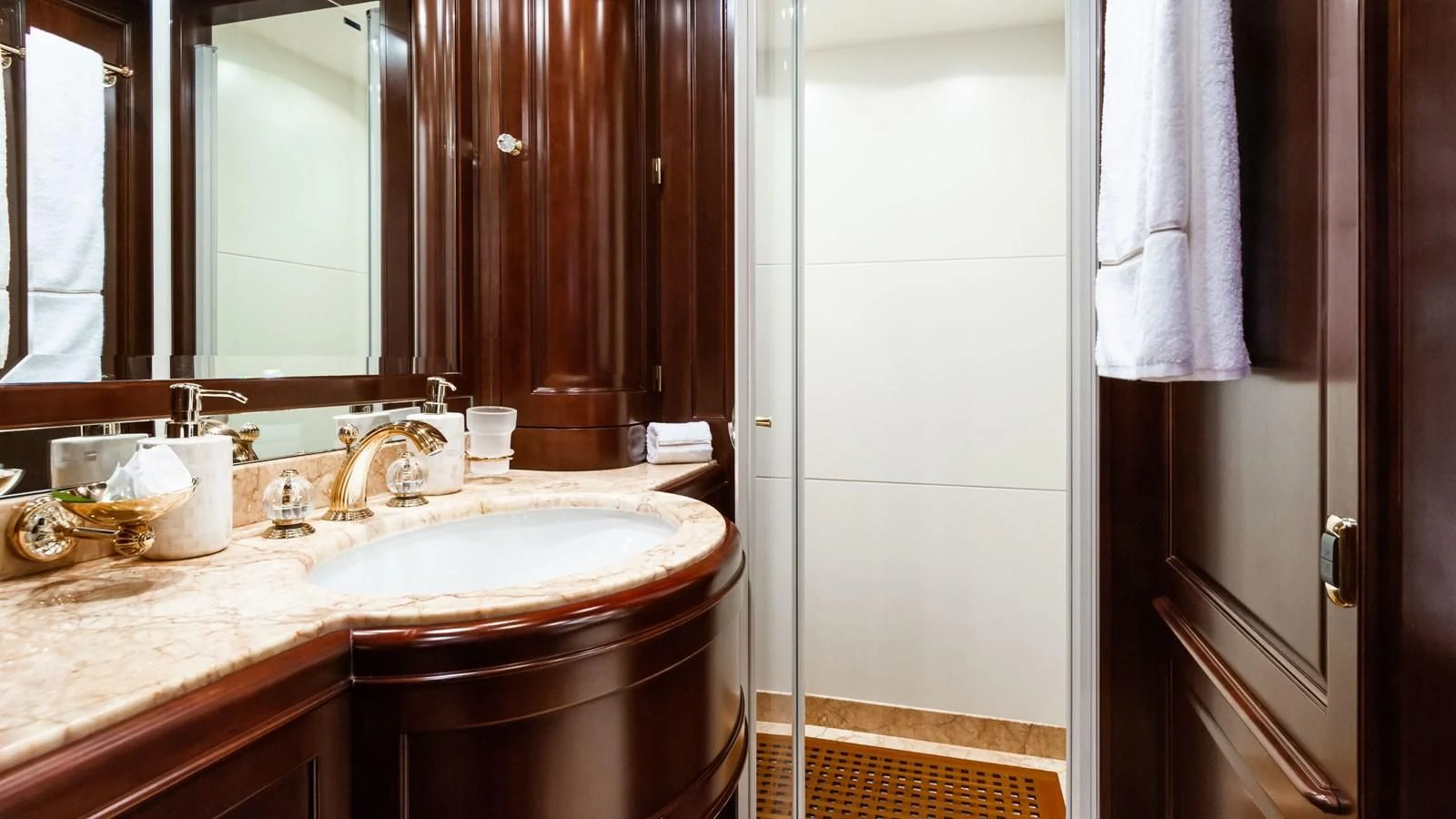a bathroom with a sink and a mirror aboard GIORGIA I Yacht for Sale