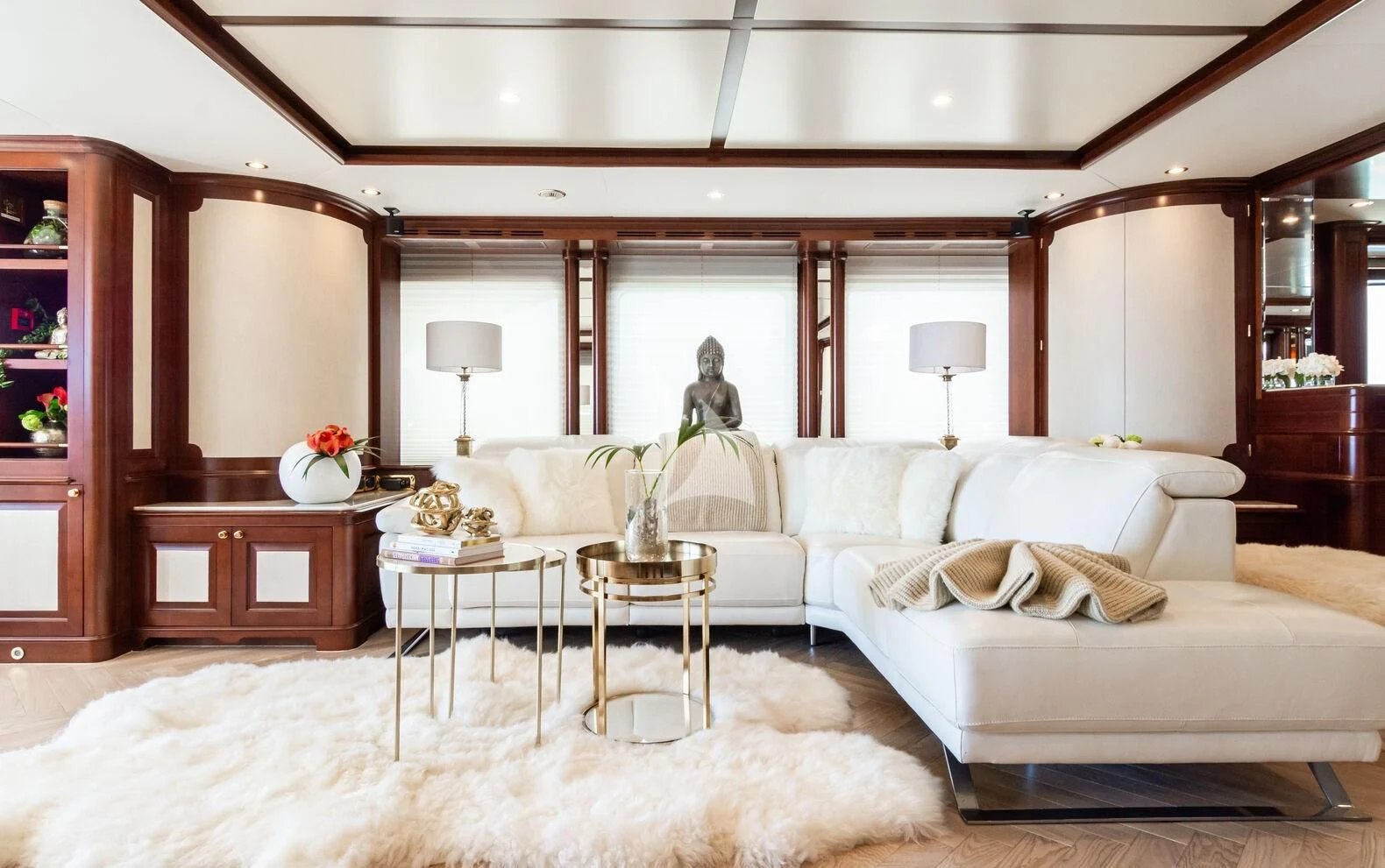 a large living room with a white couch and a large mirror aboard GIORGIA I Yacht for Sale