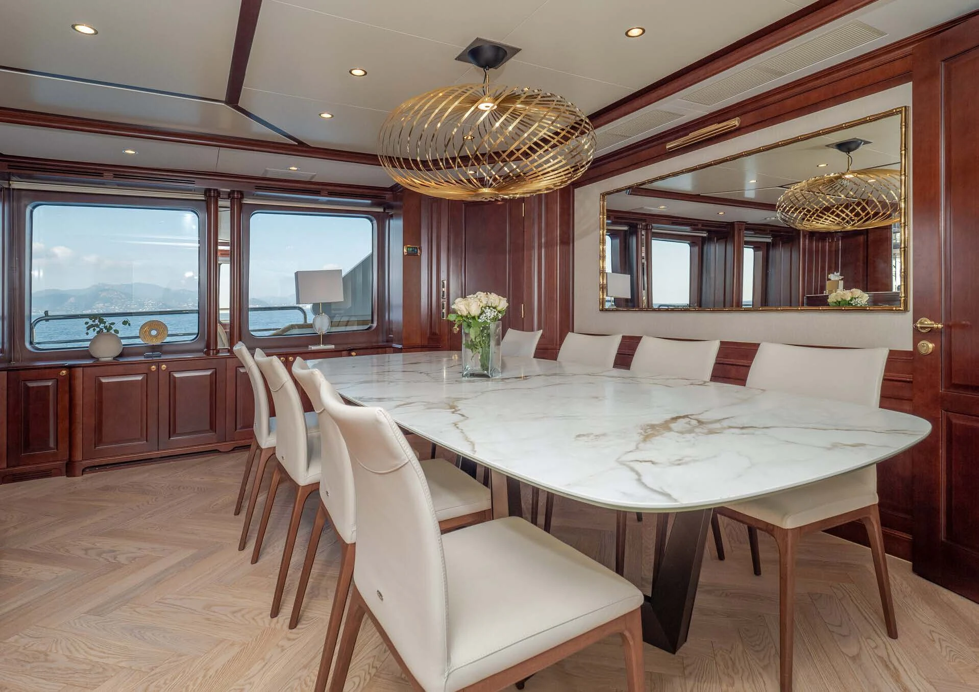 a large dining room with a large table and chairs aboard GIORGIA I Yacht for Sale
