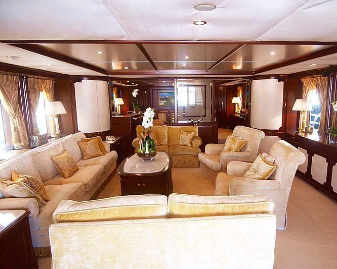 a living room with a large window aboard GIORGIA I Yacht for Sale