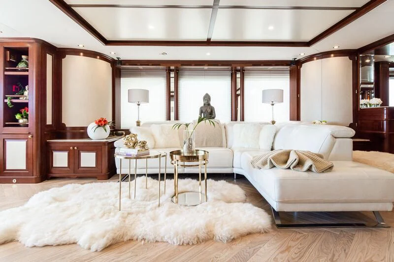 a large living room with a large mirror aboard GIORGIA I Yacht for Sale