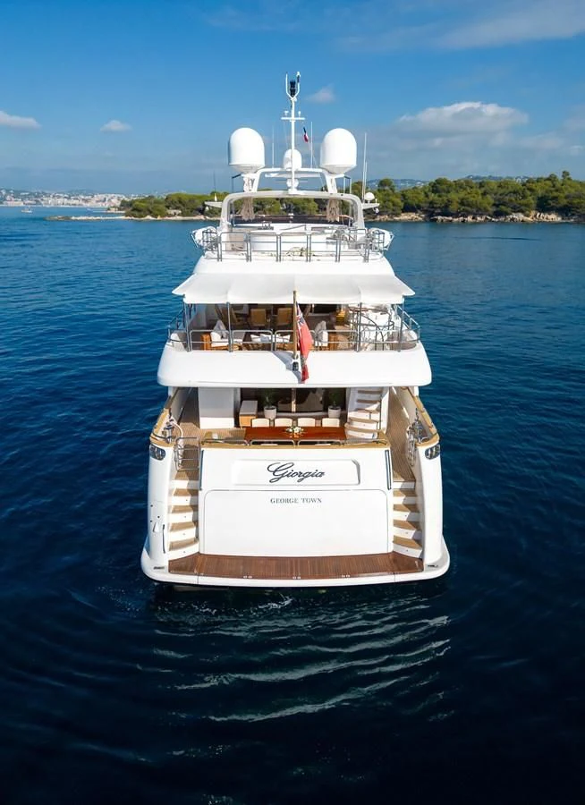 a white boat on water aboard GIORGIA I Yacht for Sale