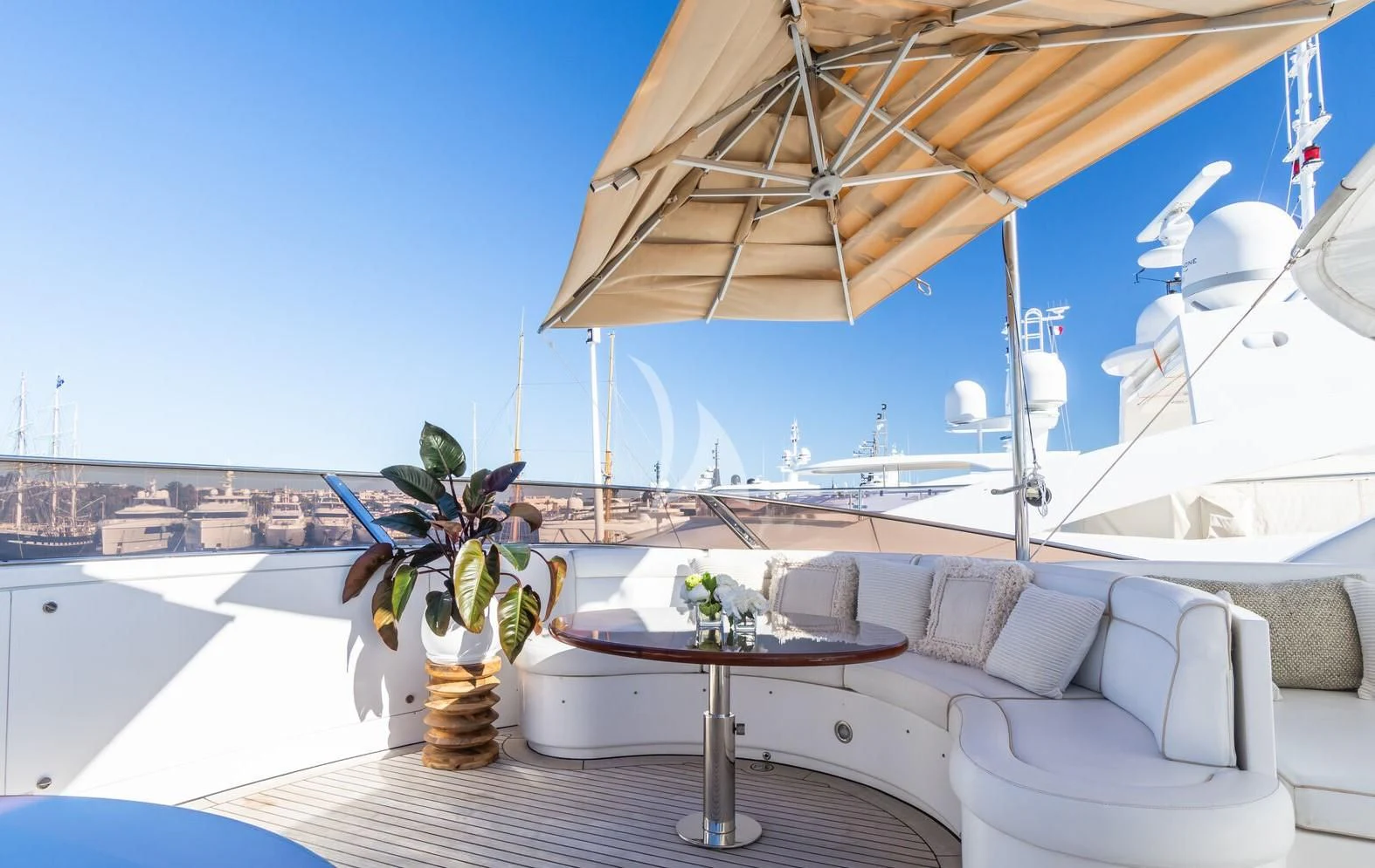 a table and chairs on a deck aboard GIORGIA I Yacht for Sale
