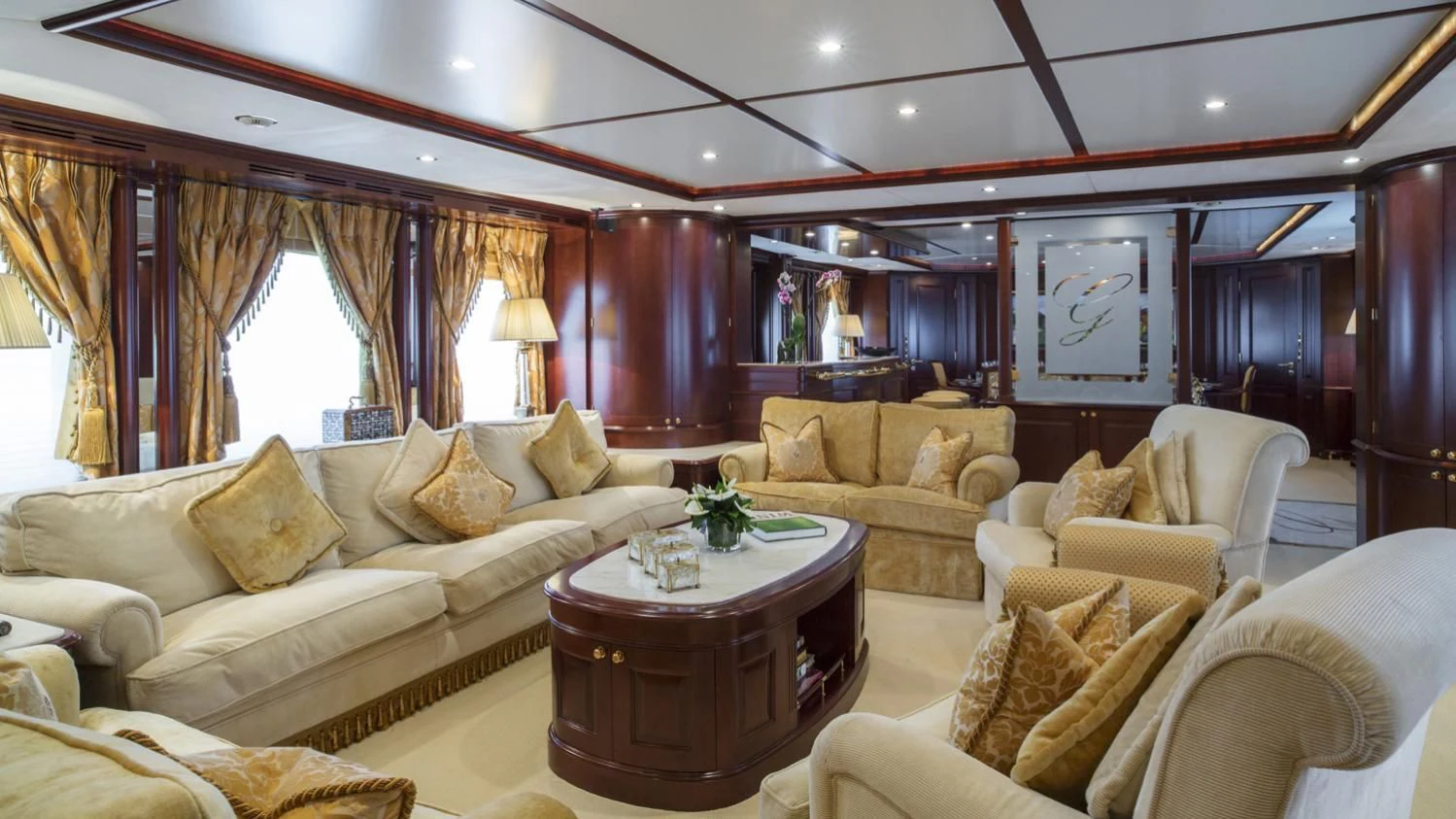 a living room with a large window aboard GIORGIA I Yacht for Sale