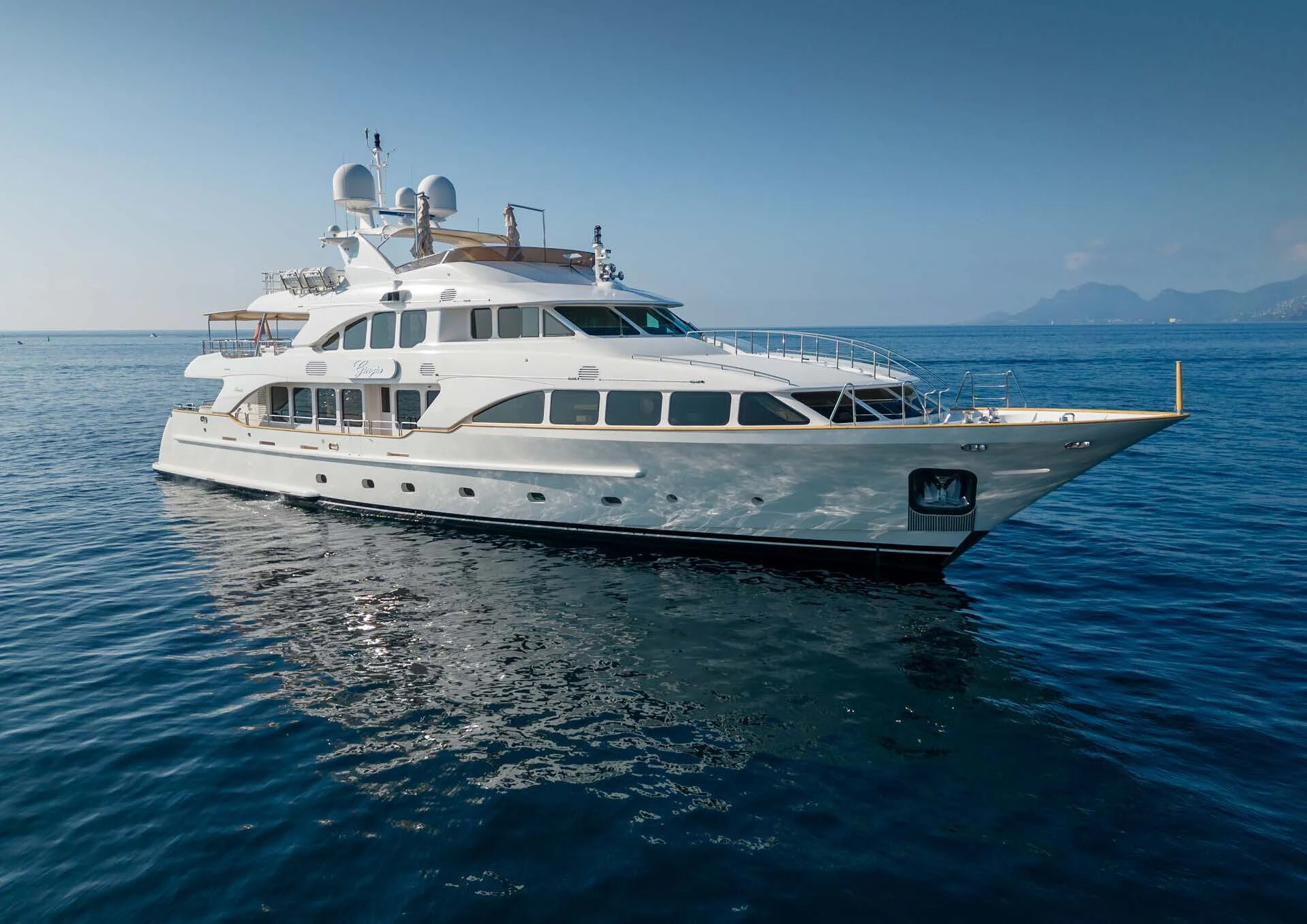 a white boat in the water aboard GIORGIA I Yacht for Sale