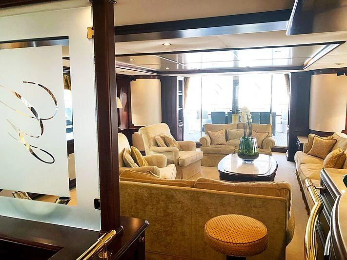 a living room with a large window aboard GIORGIA I Yacht for Sale