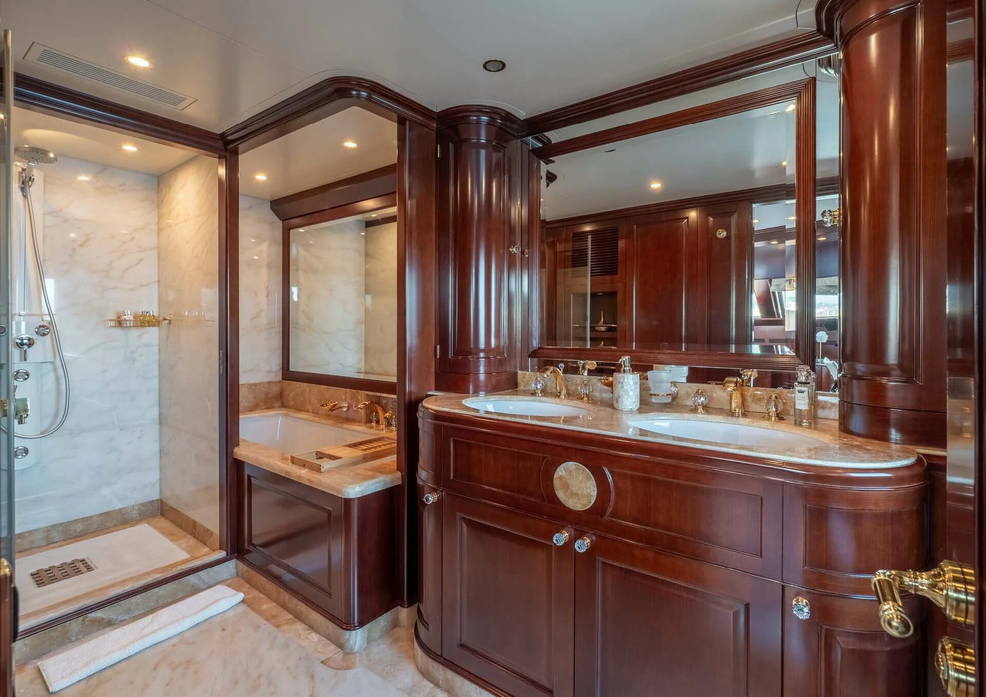 a bathroom with a large mirror aboard GIORGIA I Yacht for Sale