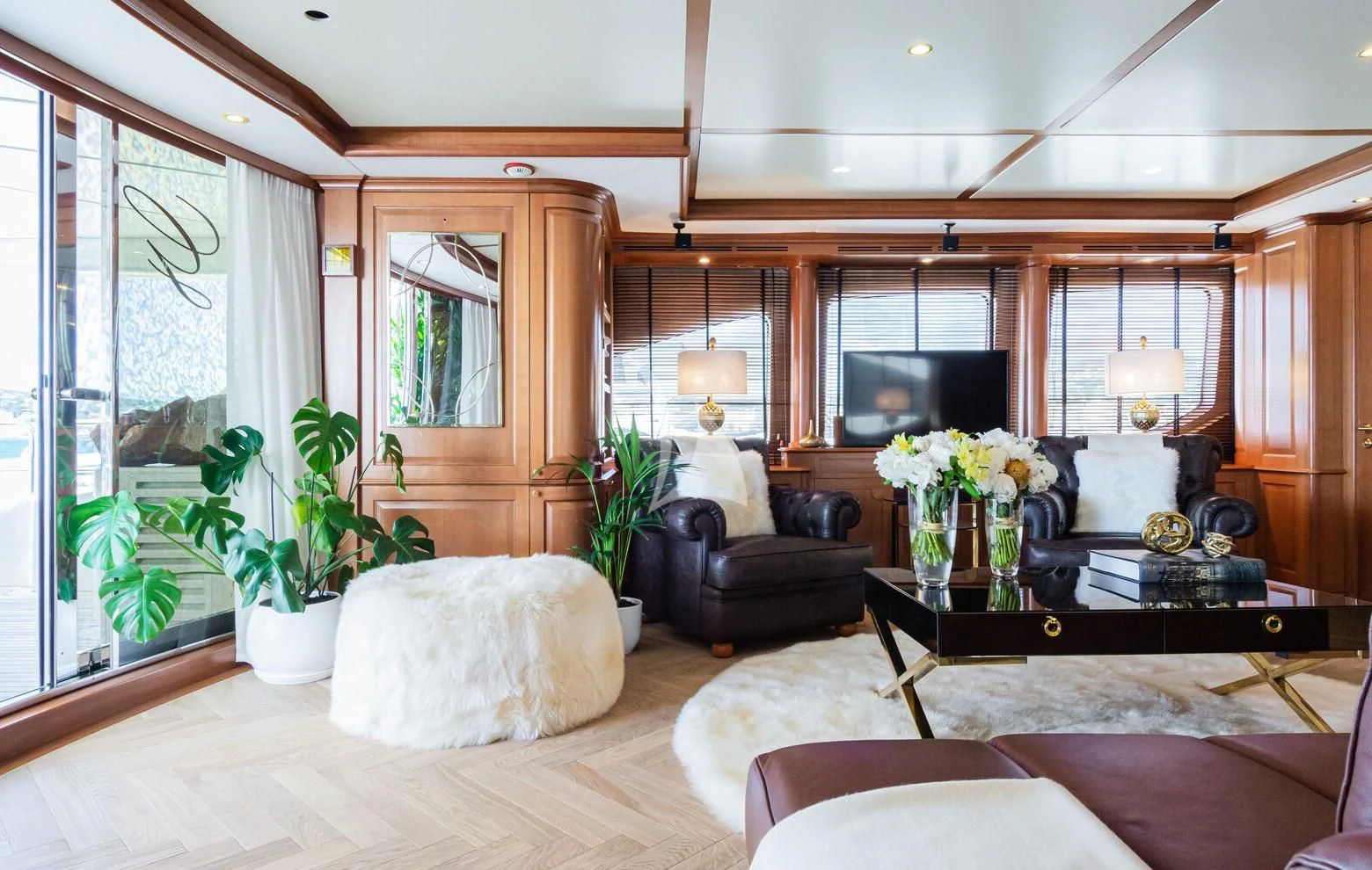 a living room with a large window aboard GIORGIA I Yacht for Sale
