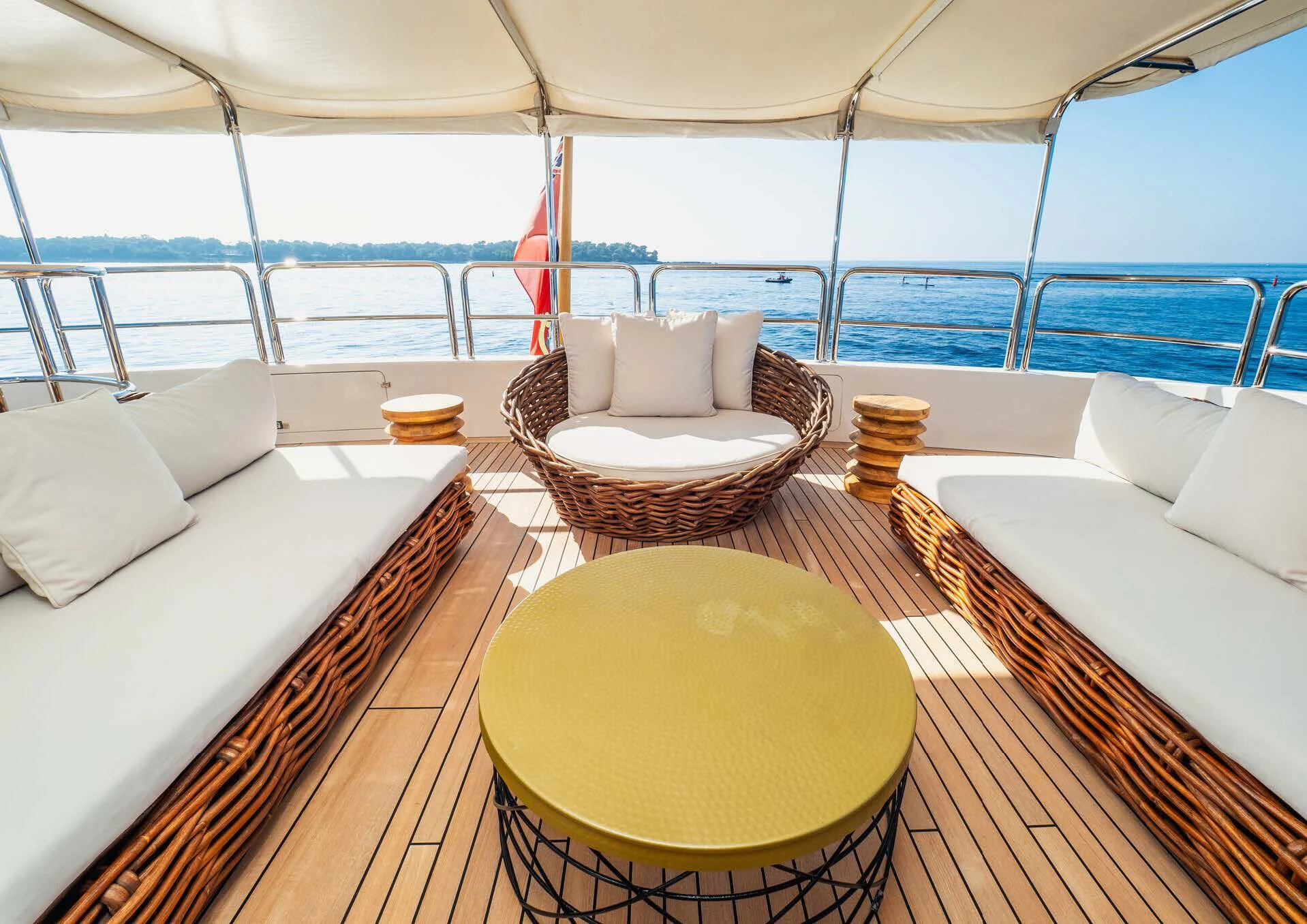 a table and chairs on a balcony aboard GIORGIA I Yacht for Sale