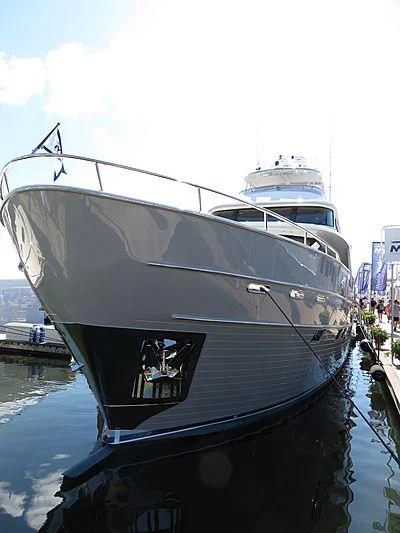a boat docked at a pier aboard ICE Yacht for Sale