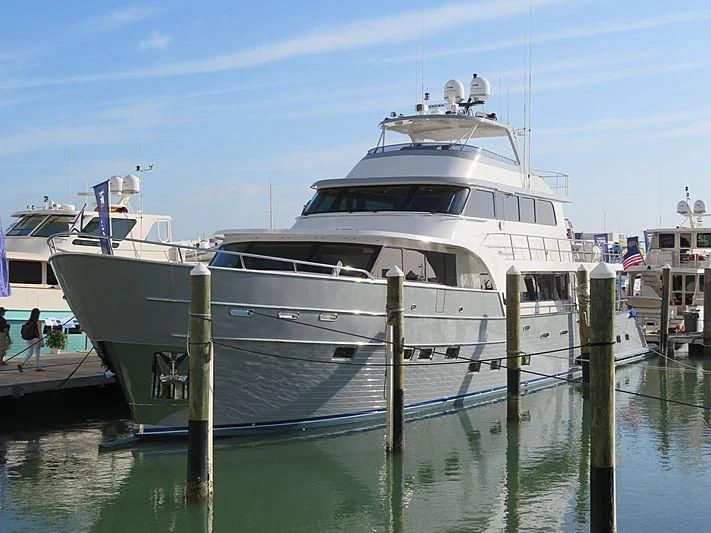 a boat docked at a pier aboard ICE Yacht for Sale