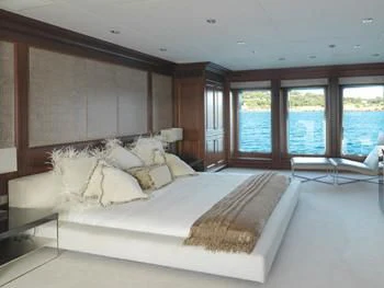 a large bed in a room aboard MY LITTLE VIOLET Yacht for Sale