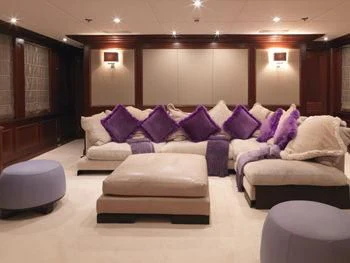 a large living room with a large mirror aboard MY LITTLE VIOLET Yacht for Sale