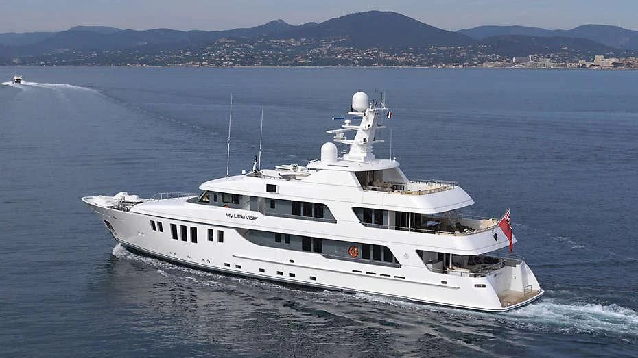 a white yacht in the water aboard MY LITTLE VIOLET Yacht for Sale