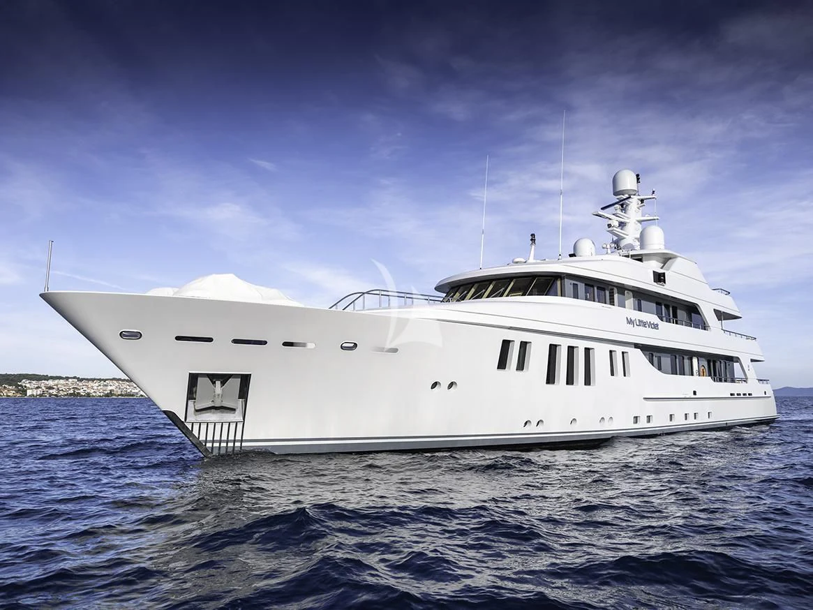 a white ship in the water aboard MY LITTLE VIOLET Yacht for Sale
