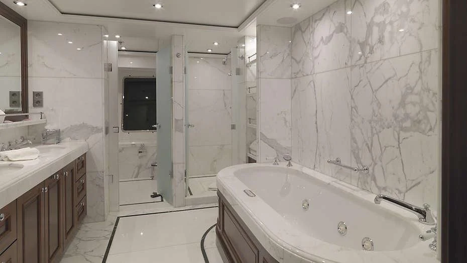 a bathroom with a tub sink and shower aboard MY LITTLE VIOLET Yacht for Sale