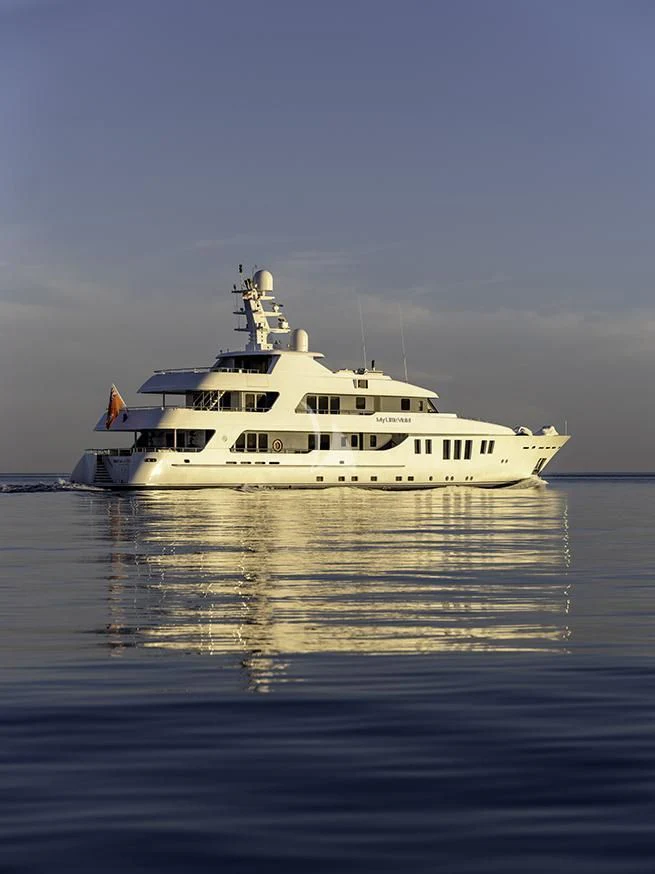 a white boat on water aboard MY LITTLE VIOLET Yacht for Sale