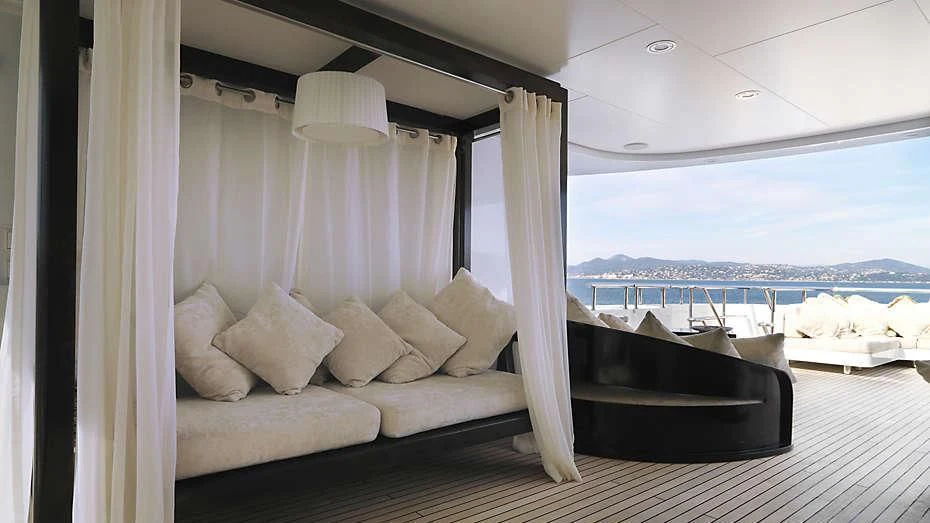 a bed with a white bed and a large window overlooking a body of water aboard MY LITTLE VIOLET Yacht for Sale