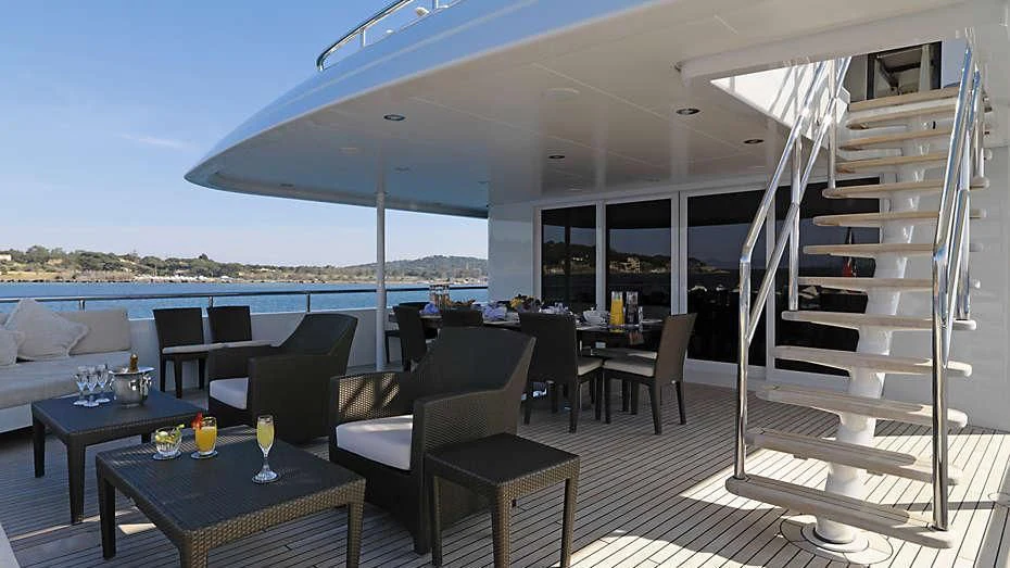 a living room with a large open roof aboard MY LITTLE VIOLET Yacht for Sale