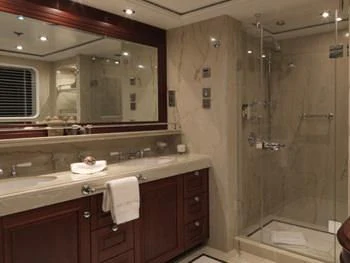 a bathroom with a large mirror aboard MY LITTLE VIOLET Yacht for Sale