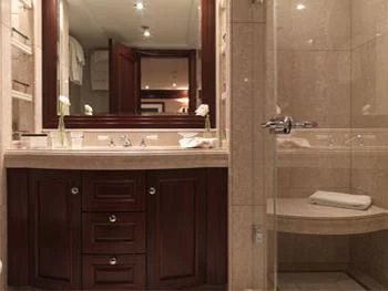 a bathroom with a sink and a mirror aboard MY LITTLE VIOLET Yacht for Sale