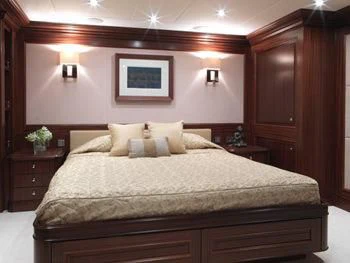 a bed with a large bed aboard MY LITTLE VIOLET Yacht for Sale