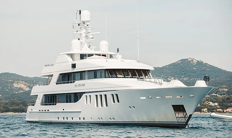 a white yacht in the water aboard MY LITTLE VIOLET Yacht for Sale