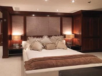 a large bed with pillows aboard MY LITTLE VIOLET Yacht for Sale