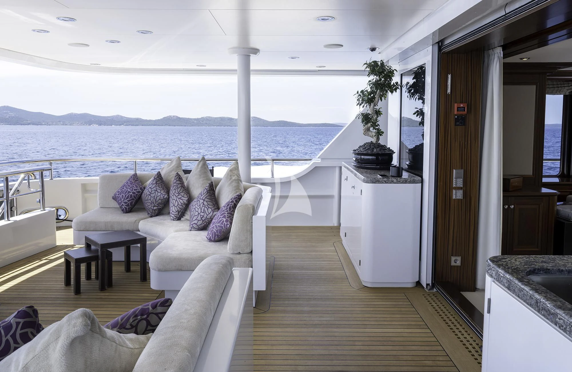 a living room with a large body of water aboard MY LITTLE VIOLET Yacht for Sale