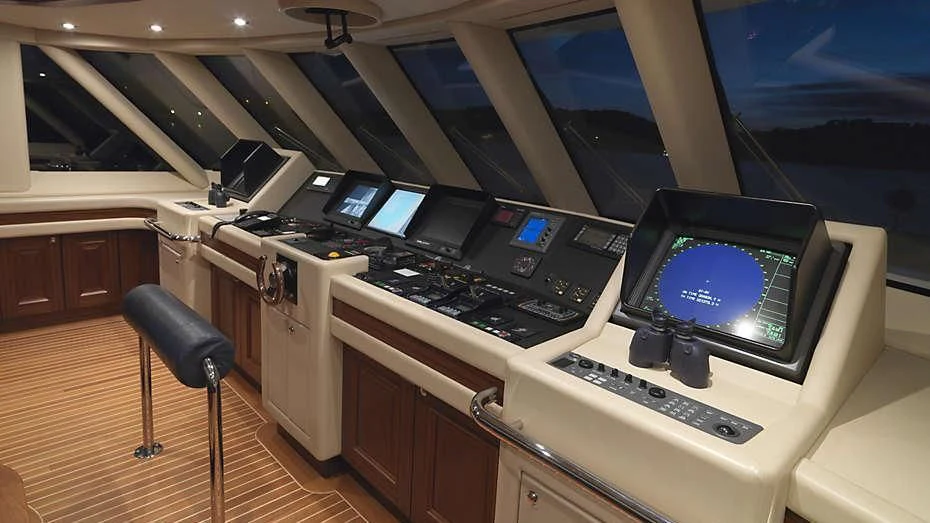 a room with computers and monitors aboard MY LITTLE VIOLET Yacht for Sale