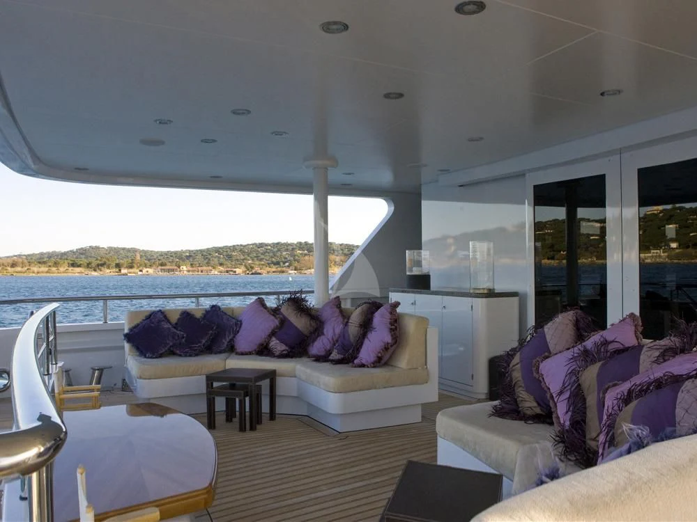 a living room with a large window aboard MY LITTLE VIOLET Yacht for Sale