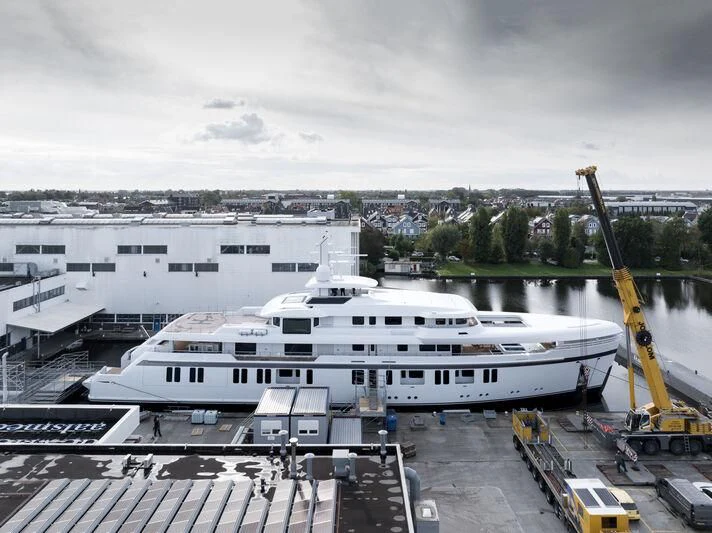a large cruise ship docked aboard PROMISE.D Yacht for Sale