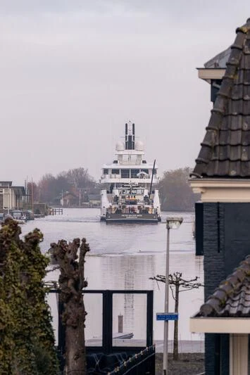 a large ship in the water aboard PROMISE.D Yacht for Sale