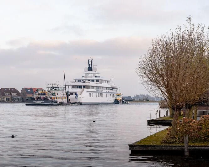 a large white ship in the water aboard PROMISE.D Yacht for Sale