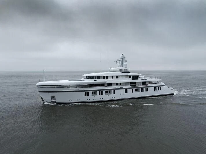 a large white boat in the water aboard PROMISE.D Yacht for Sale