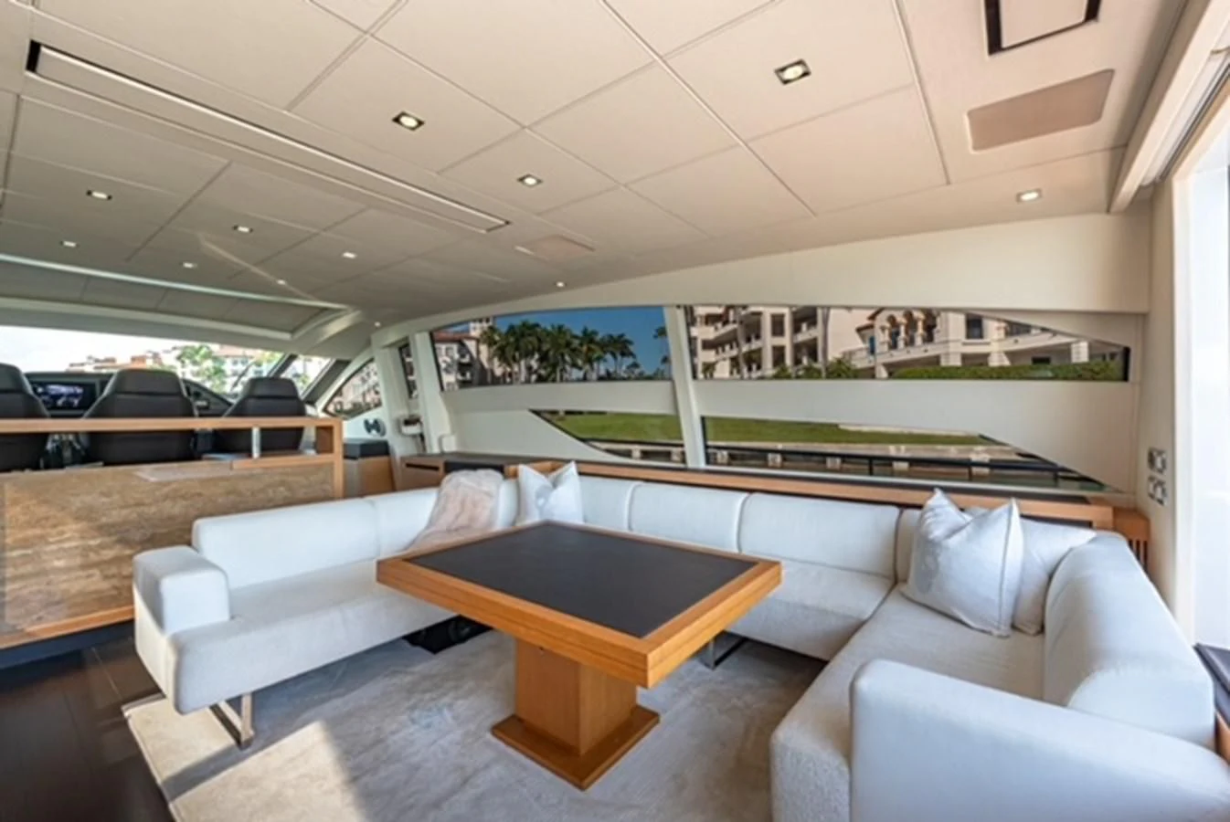 a room with couches and a table aboard WRAITH Yacht for Sale