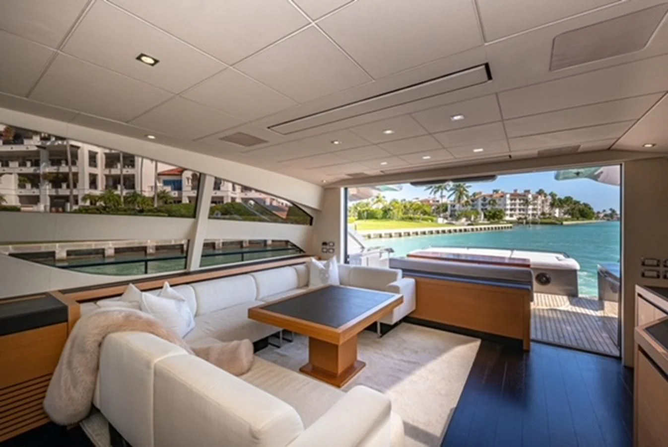 a room with a bed and a table aboard WRAITH Yacht for Sale