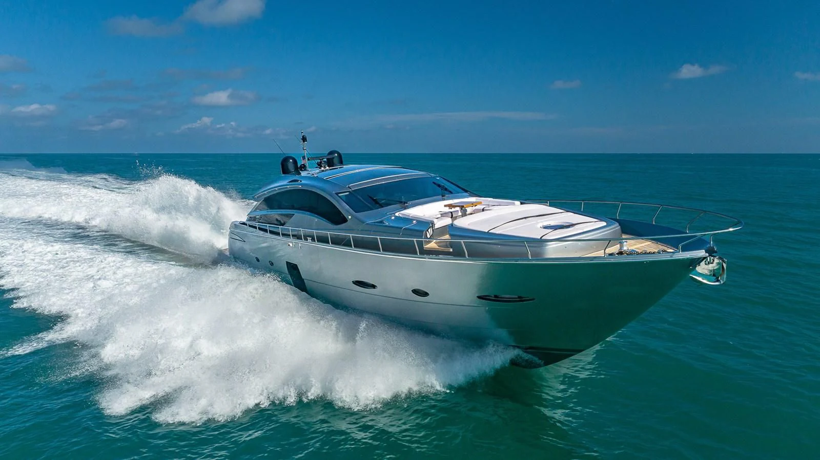 a white yacht on the water aboard WRAITH Yacht for Sale