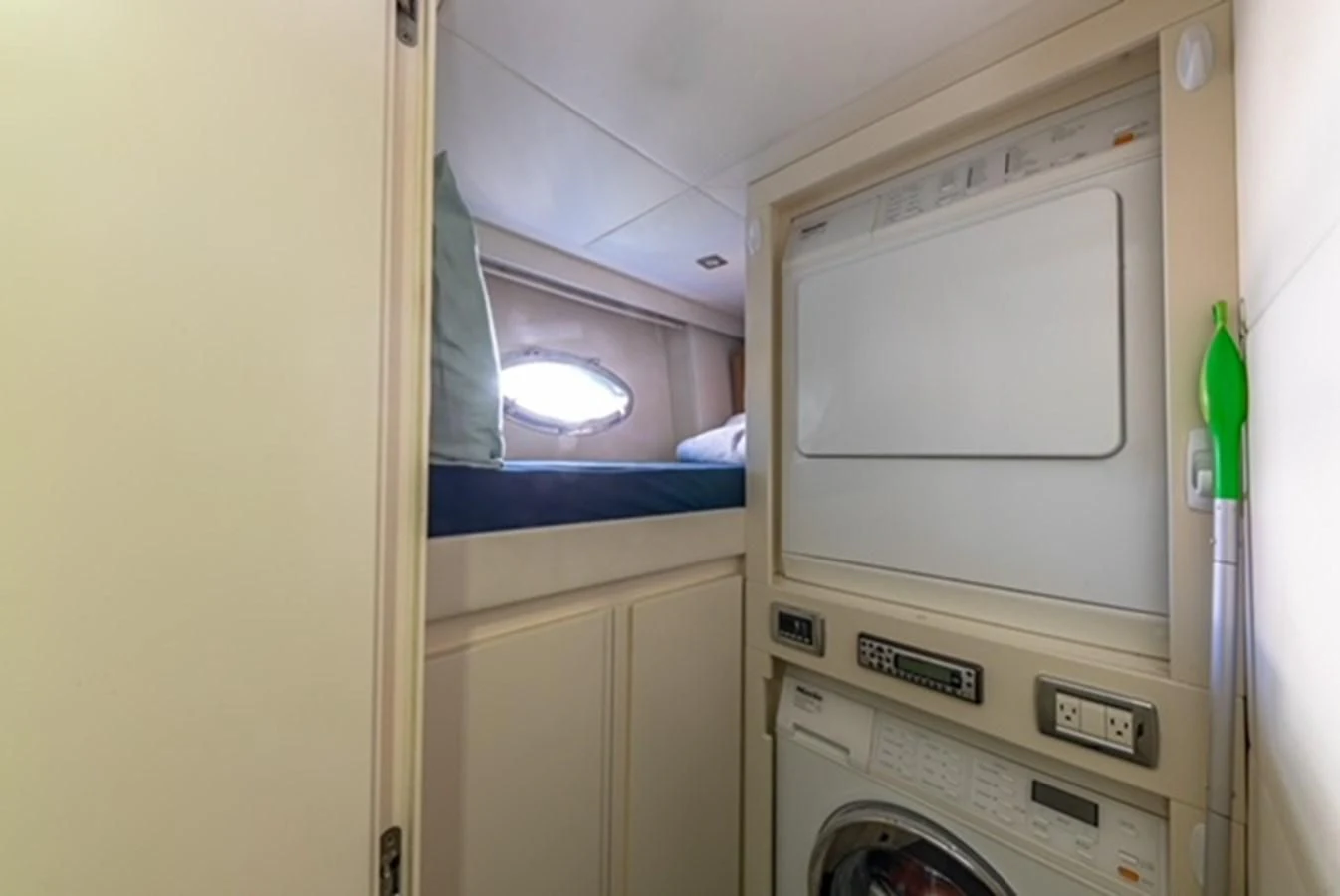 a white washing machine aboard WRAITH Yacht for Sale