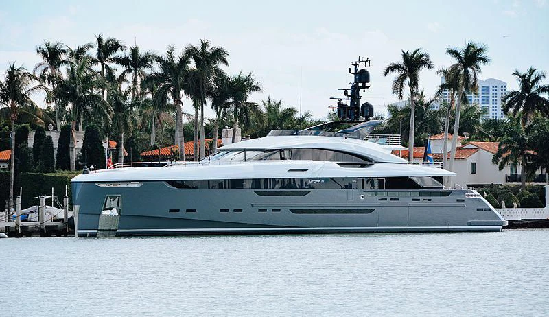 a white yacht in the water aboard UTOPIA IV Yacht for Sale