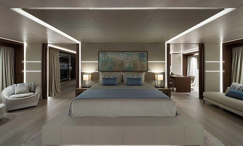 a large bedroom with a large bed aboard UTOPIA IV Yacht for Sale