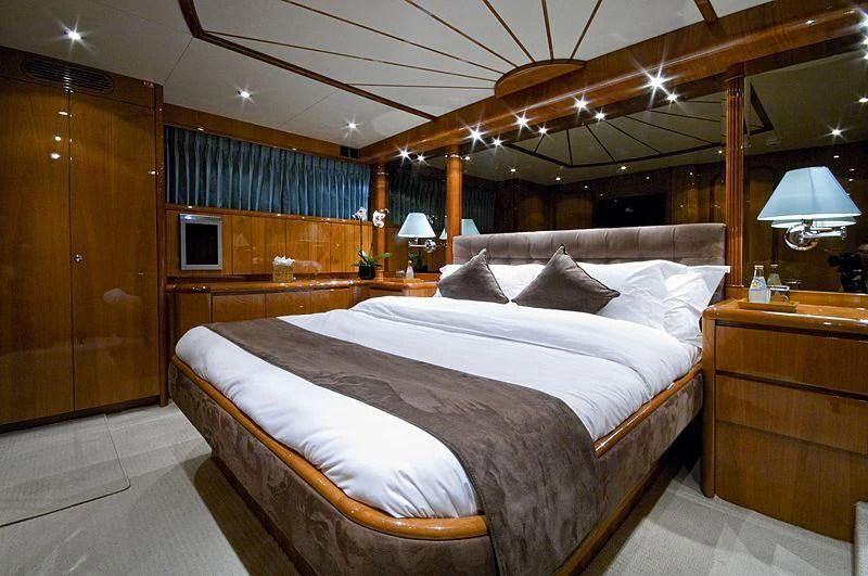 a bed in a room aboard IMPORTANT BUSINESS Yacht for Sale