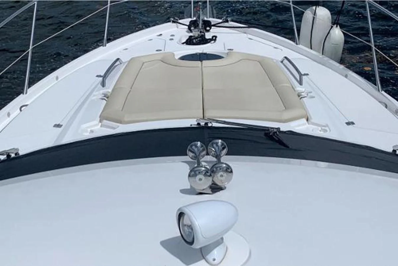 a white car with a hood aboard MOONLIGHT DRIVE Yacht for Sale