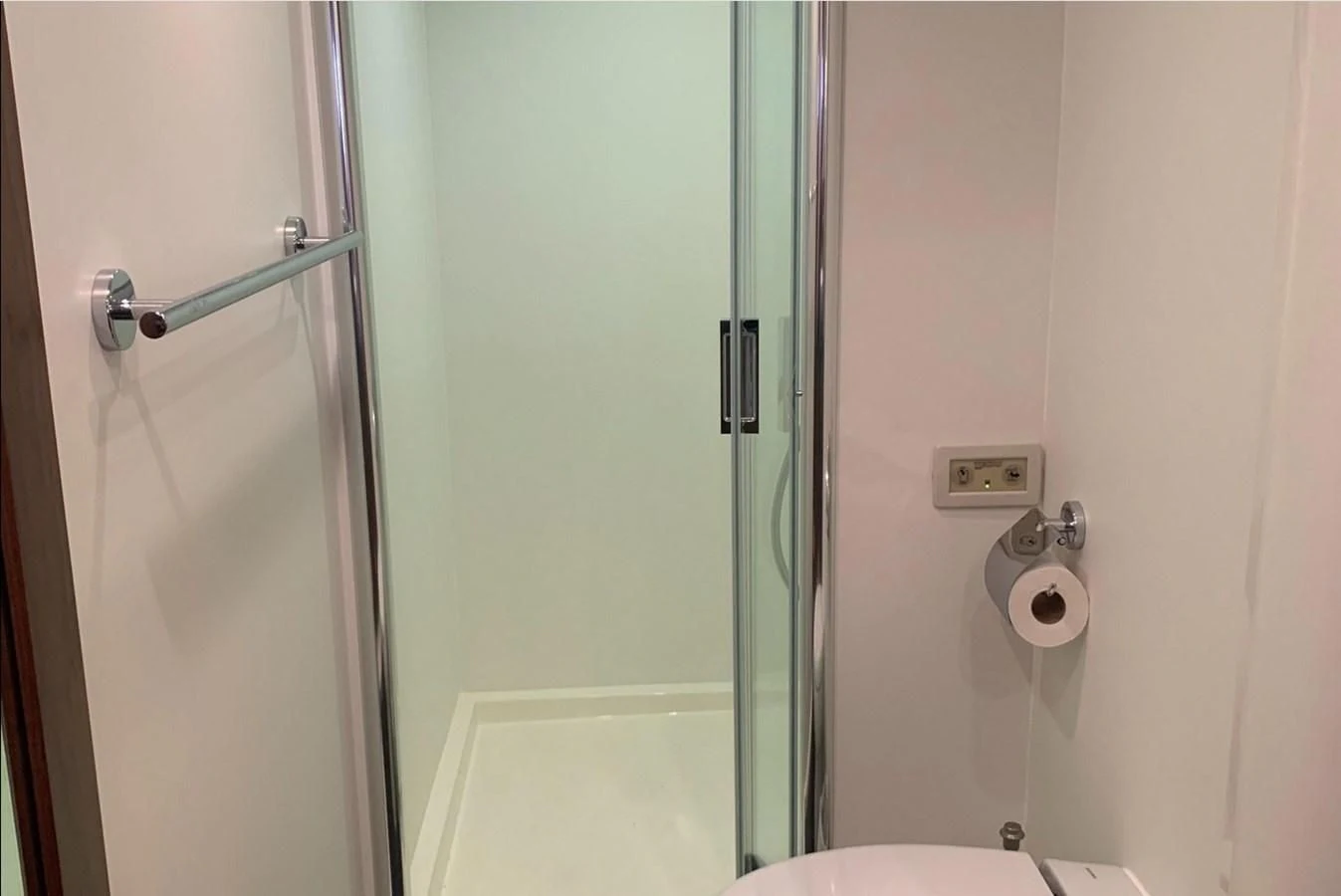 a bathroom with a toilet and a shower aboard MOONLIGHT DRIVE Yacht for Sale