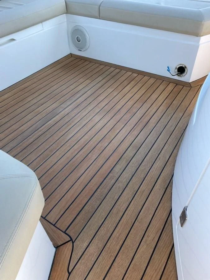 a wooden floor with a white wall aboard MOONLIGHT DRIVE Yacht for Sale