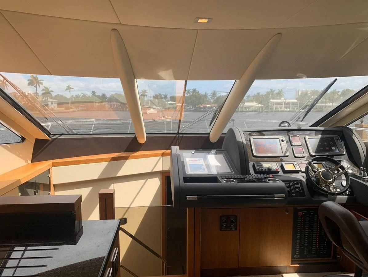 a room with computers and monitors aboard MOONLIGHT DRIVE Yacht for Sale