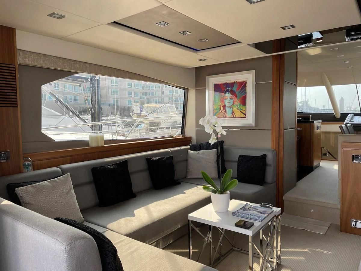 a living room with a large window aboard MOONLIGHT DRIVE Yacht for Sale