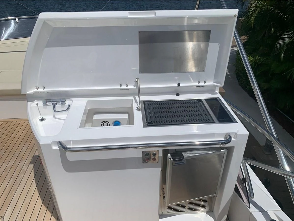 a white stove with a vent aboard MOONLIGHT DRIVE Yacht for Sale