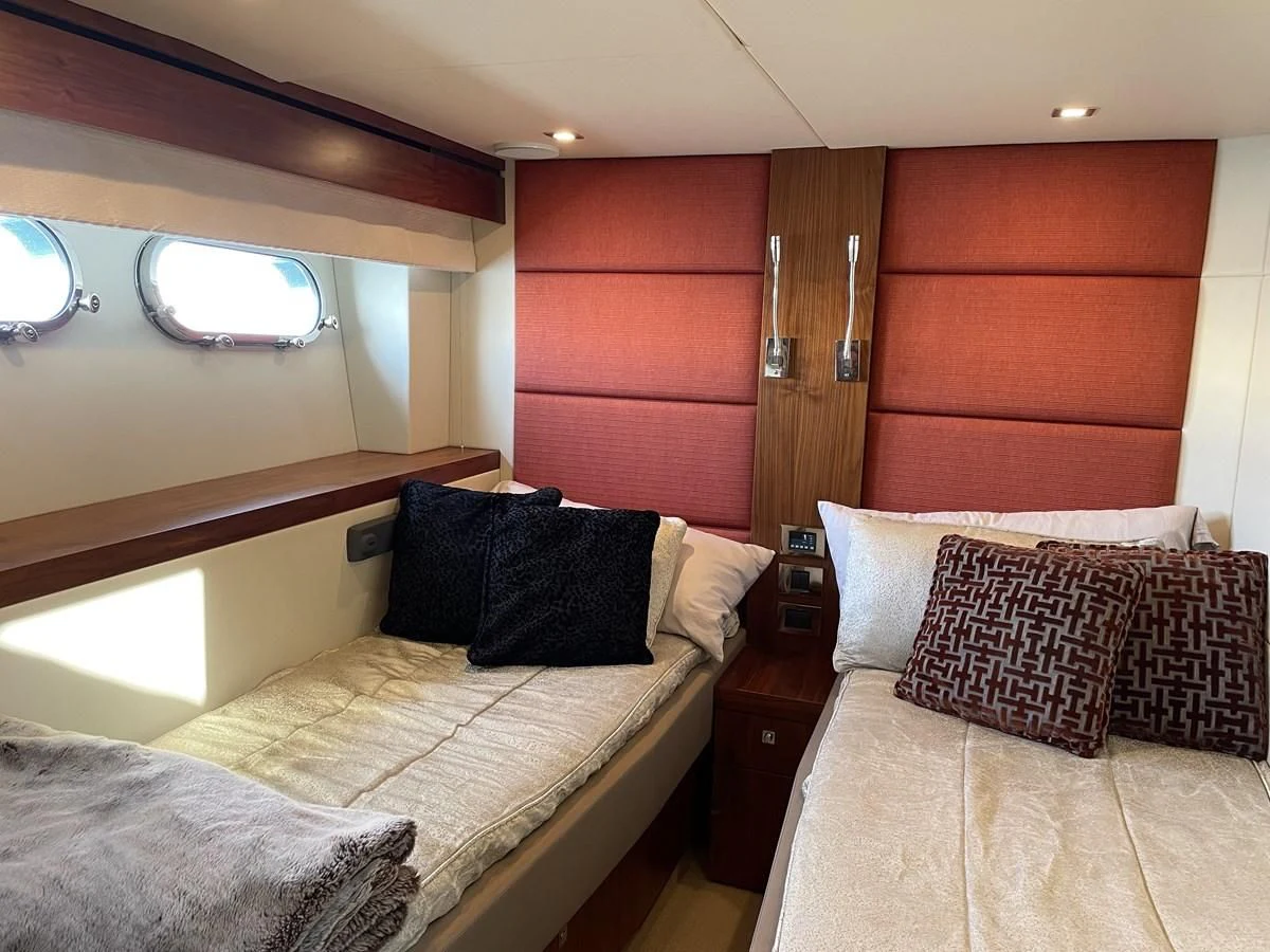 a room with two beds aboard MOONLIGHT DRIVE Yacht for Sale